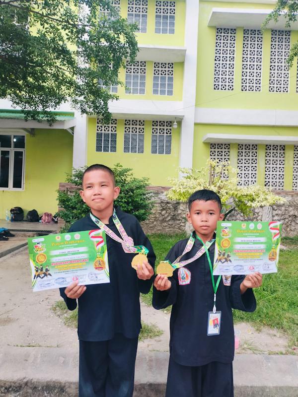 Gagasan Kepsek SDN 23 Bekerjasama Perguruan Pencak Silat Elang Kesatria Bengkalis Raih Medali Emas